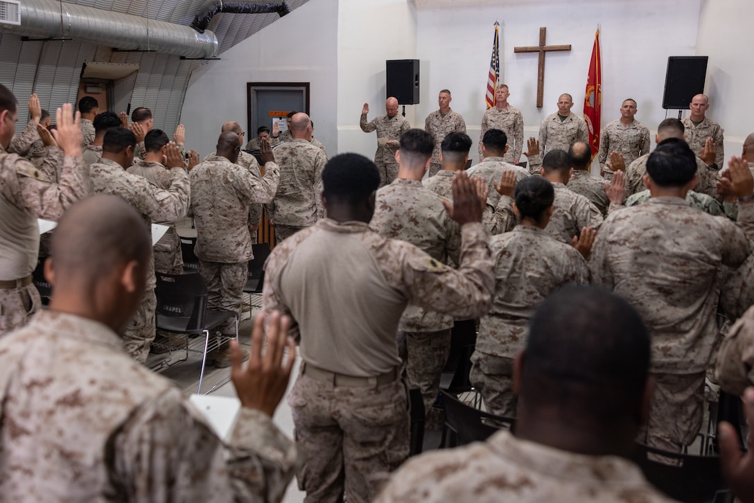 U.S. Navy Hospital Corpsmen recite the Corpsman Oath as part of a celebration of the Navy Hospital Corpsman 127th birthday during Integrated Training Exercise 3-25 (ITX 3-25) on Marine Corps Air Ground Combat Center, Twentynine Palms, California, June 17, 2025. The Hospital Corps is the most decorated corps in the Navy and was established on June 17, 1898. It consists of more than 26,000 active duty and reserve hospital corpsmen. ITX is a critical Marine Air-Ground Task Force exercise for the Marine Forces Reserve’s training cycle, confirming unit readiness through live-fire and combined arms integration. (U.S. Marine Corps photo by Staff Sgt. Scott Jenkins)