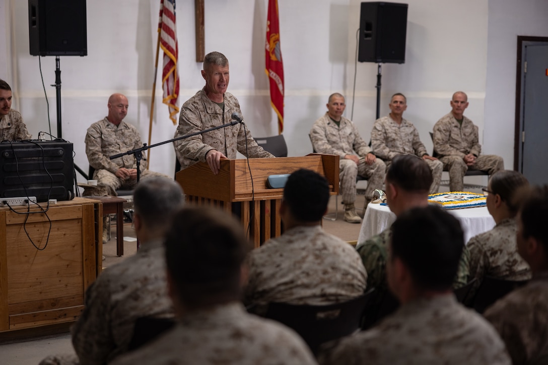 U.S. Marine Corps Brig. Gen. John K. Jarrard, commanding general of 4th Marine Division, speaks to Marines and Sailors as part of a celebration of the Navy Hospital Corpsman 127th birthday during Integrated Training Exercise 3-25 (ITX 3-25) on Marine Corps Air Ground Combat Center, Twentynine Palms, California, June 17, 2025. The Hospital Corps is the most decorated corps in the Navy and was established on June 17, 1898. It consists of more than 26,000 active duty and reserve hospital corpsmen. ITX is a critical Marine Air-Ground Task Force exercise for the Marine Forces Reserve’s training cycle, confirming unit readiness through live-fire and combined arms integration. (U.S. Marine Corps photo by Staff Sgt. Scott Jenkins)