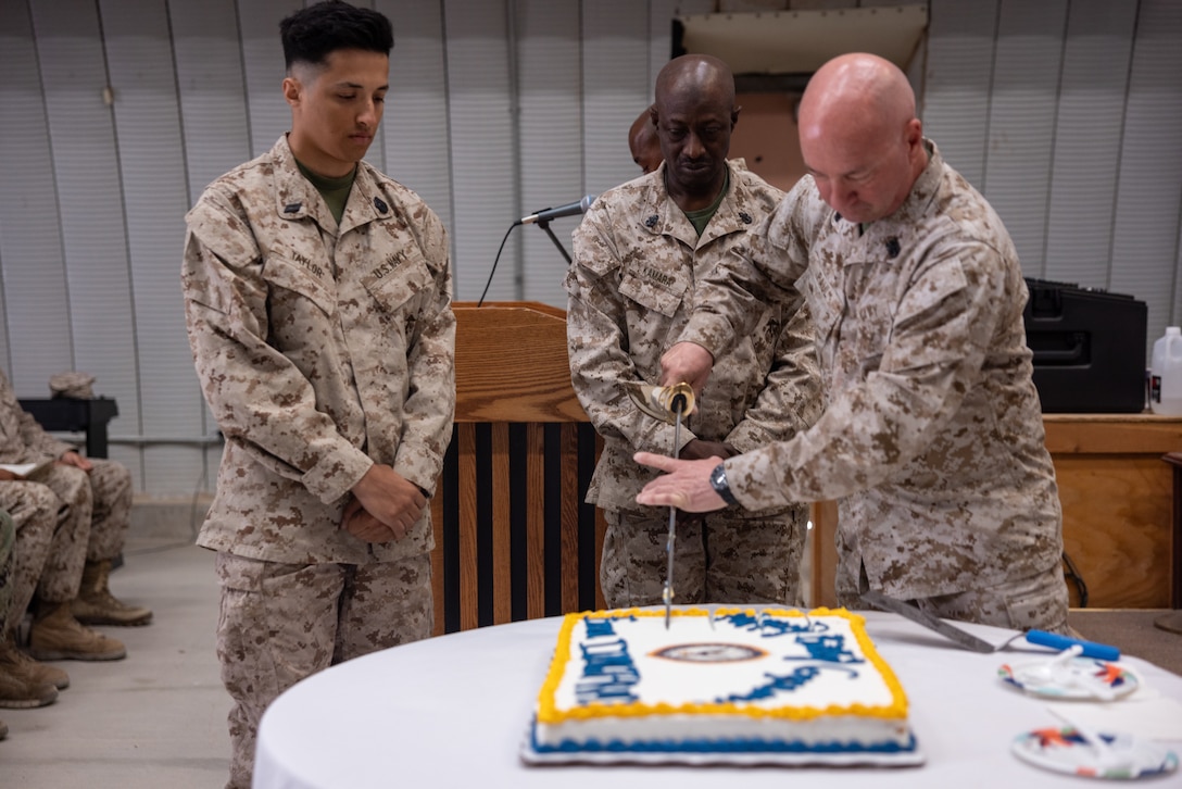 U.S. Navy Command Master Chief Petty Officer Matthew R. Paul, command master chief of 4th Marine Division, cuts a birthday cake as part of a celebration of the Navy Hospital Corpsman 127th birthday during Integrated Training Exercise 3-25 (ITX 3-25) on Marine Corps Air Ground Combat Center, Twentynine Palms, California, June 17, 2025. The Hospital Corps is the most decorated corps in the Navy and was established on June 17, 1898. It consists of more than 26,000 active duty and reserve hospital corpsmen. ITX is a critical Marine Air-Ground Task Force exercise for the Marine Forces Reserve’s training cycle, confirming unit readiness through live-fire and combined arms integration. (U.S. Marine Corps photo by Staff Sgt. Scott Jenkins)