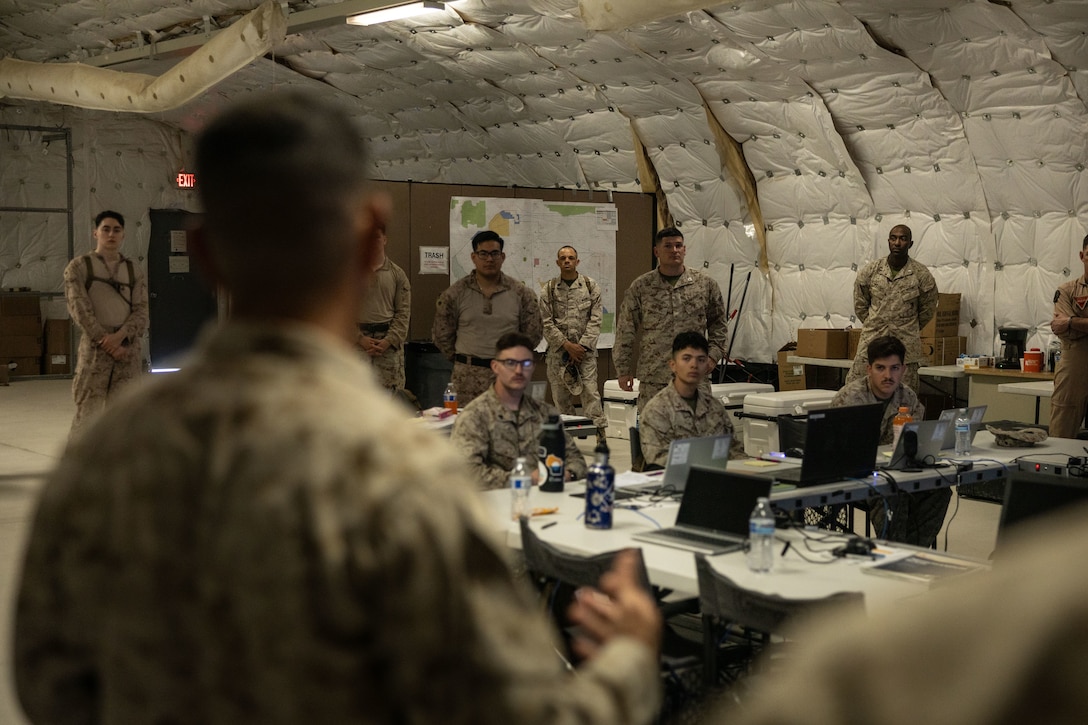 U.S. Marine Corps Maj. Gen. John Kelliher, commanding general of 4th Marine Aircraft Wing, Marine Forces Reserve, speaks to Marines at Integrated Training Exercise 3-25, Marine Corps Air Ground Combat Center, Twentynine Palms, California, June 11, 2025. ITX is a critical Marine Air-Ground Task Force exercise for the Marine Forces Reserve’s training cycle, confirming unit readiness through live-fire and combined arms integration. (U.S. Marine Corps photo by Lance Cpl. Edward Spears)