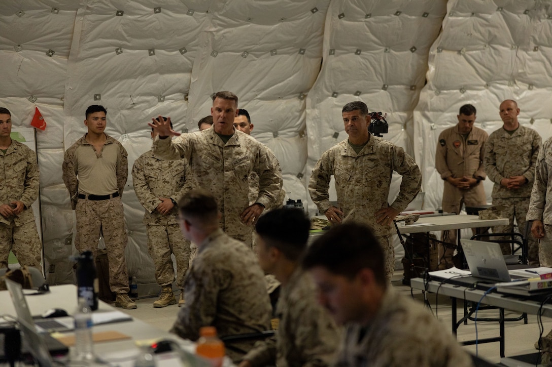 U.S. Marine Corps Maj. Gen. John Kelliher, commanding general of 4th Marine Aircraft Wing, Marine Forces Reserve, visit Marines at Integrated Training Exercise 3-25, Marine Corps Air Ground Combat Center, Twentynine Palms, California, June 11, 2025. ITX is a critical Marine Air-Ground Task Force exercise for the Marine Forces Reserve’s training cycle, confirming unit readiness through live-fire and combined arms integration. (U.S. Marine Corps photo by Lance Cpl. Edward Spears)