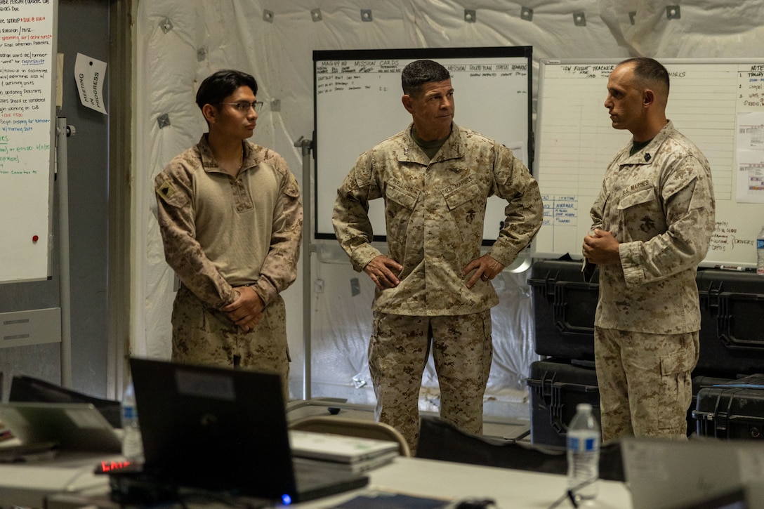 U.S. Marine Corps Maj. Gen. John Kelliher, commanding general of 4th Marine Aircraft Wing, Marine Forces Reserve, speaks with Marines at Integrated Training Exercise 3-25, Marine Corps Air Ground Combat Center, Twentynine Palms, California, June 11, 2025. ITX is a critical Marine Air-Ground Task Force exercise for the Marine Forces Reserve’s training cycle, confirming unit readiness through live-fire and combined arms integration. (U.S. Marine Corps photo by Lance Cpl. Edward Spears)