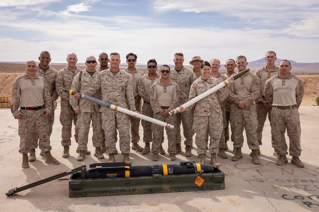 U.S. Marines pose for a photo with Lt. Gen. Leonard F. Anderson IV, commander of Marine Forces Reserve, during Integrated Training Exercise 3-25 (ITX 3-25) on Marine Corps Air Ground Combat Center, Twentynine Palms, California, June 14, 2025. ITX is a critical Marine Air-Ground Task Force exercise for the Marine Forces Reserve’s training cycle, confirming unit readiness through live-fire and combined arms integration. (U.S. Marine Corps photo by Staff Sgt. Scott Jenkins)