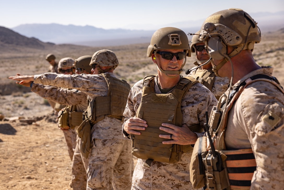 U.S. Marine Corps Lt. Gen. Leonard F. Anderson IV (third from right), commander of Marine Forces Reserve, speaks with Tactical Training and Exercise Control Group leaders at Range 400 during Integrated Training Exercise 3-25 (ITX 3-25) on Marine Corps Air Ground Combat Center, Twentynine Palms, California, June 14, 2025. ITX is a critical Marine Air-Ground Task Force exercise for the Marine Forces Reserve’s training cycle, confirming unit readiness through live-fire and combined arms integration. (U.S. Marine Corps photo by Staff Sgt. Scott Jenkins)