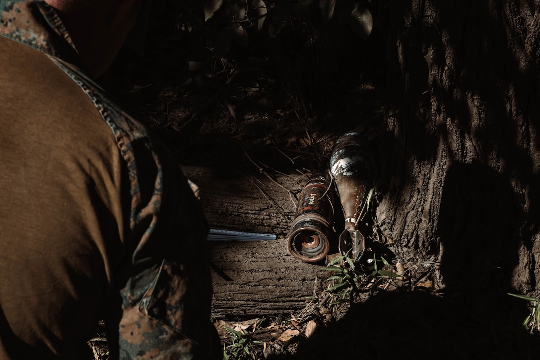 U.S. Marine Corps Sgt. Declan Finnegan, an explosive ordnance disposal technician, with Marine Rotational Force Darwin – 25.3, discovers unexploded ordnance in the Rabaul region of Papua New Guinea, on June 4, 2025.