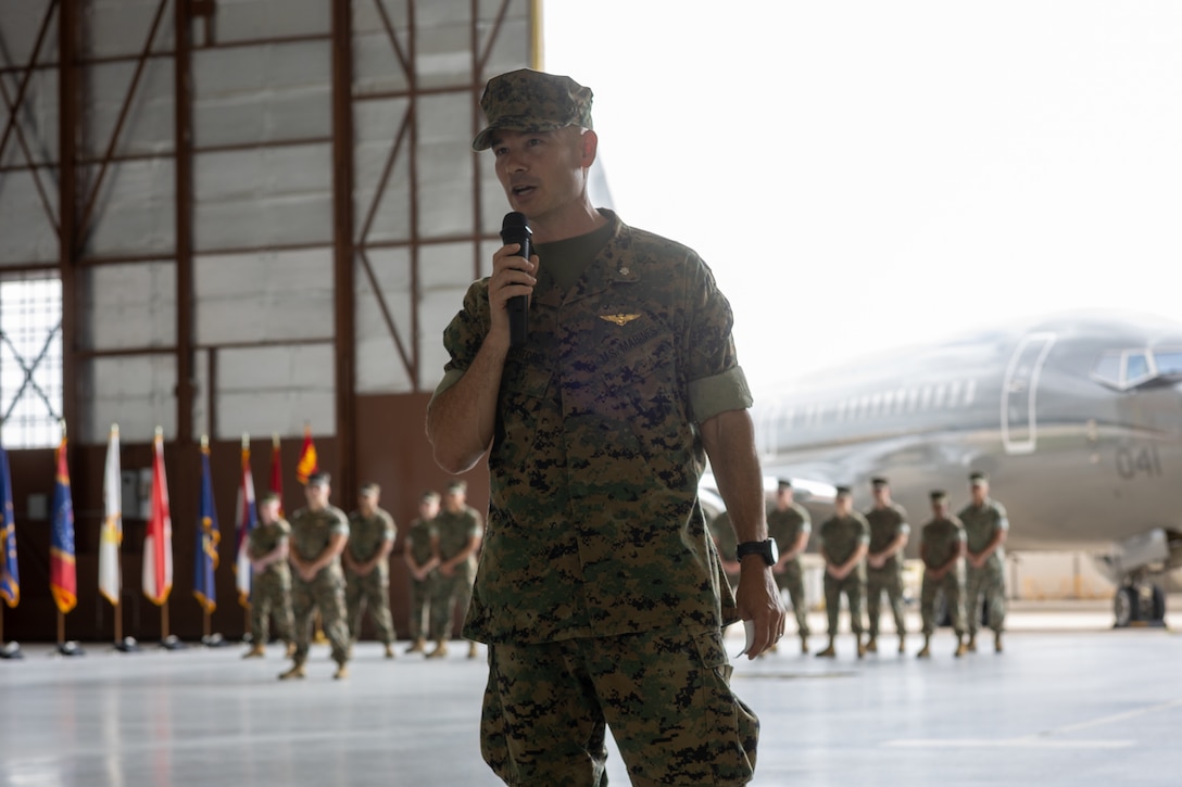 U.S. Marine Corps Lt. Col. Hanson W. Pitchford, commanding officer, Marine Transport Squadron (VMR) 1, Marine Aircraft Group 41, 4th Marine Aircraft Wing, Marine Forces Reserve, speaks during a ceremony recognizing the unit’s classification as a full operational capability squadron at Naval Air Station Joint Reserve Base Fort Worth, Texas, June 18, 2025. VMR-1’s achievement of full operational capability with the C-40A aircraft, marks a significant milestone in squadron readiness and success. (U.S. Marine Corps photo by Cpl. Kanoa Thomas)