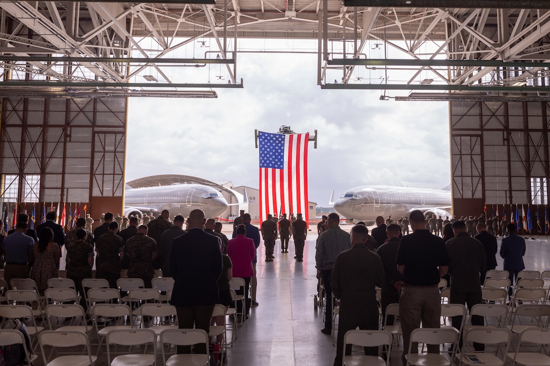 U.S. Marines with Marine Transport Squadron (VMR) 1, Marine Aircraft Group 41, 4th Marine Aircraft Wing, Marine Forces Reserve, conducted a ceremony at Naval Air Station Joint Reserve Base Fort Worth, Texas, June 18, 2025. The ceremony celebrated VMR-1’s achievement of full operational capability with the C-40A aircraft, marking a significant milestone in squadron readiness and success. (U.S. Marine Corps photo by Cpl. Kanoa Thomas)