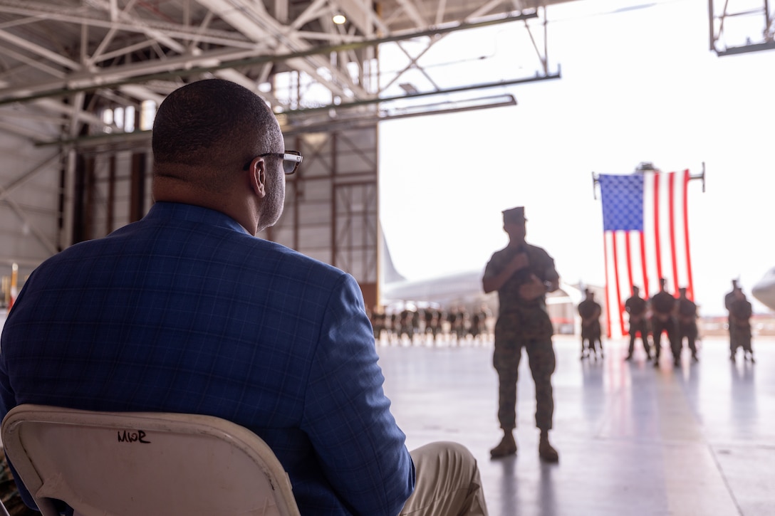 U.S. Rep. Marc Veasey, the representative of Texas’ 33rd Congressional District, watches Marine Transport Squadron (VMR) 1’s ceremony recognizing its classification as a full operational capability squadron, Naval Air Station Joint Reserve Base Fort Worth, Texas, June 18, 2025.  VMR-1’s achievement of full operational capability with the C-40A aircraft, marks a significant milestone in squadron readiness and success. (U.S. Marine Corps photo by Cpl. Kanoa Thomas)