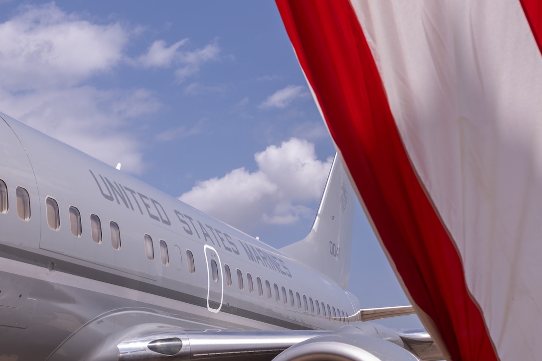 A U.S. Marine Corps C-40A aircraft with Marine Transport Squadron (VMR) 1 sits on the fight line during a ceremony recognizing the unit’s classification as a full operational capability squadron at Naval Air Station Joint Reserve Base Fort Worth, Texas, June 18, 2025.  VMR-1’s achievement of full operational capability with the C-40A aircraft, marks a significant milestone in squadron readiness and success. (U.S. Marine Corps photo by Cpl. Kanoa Thomas)
