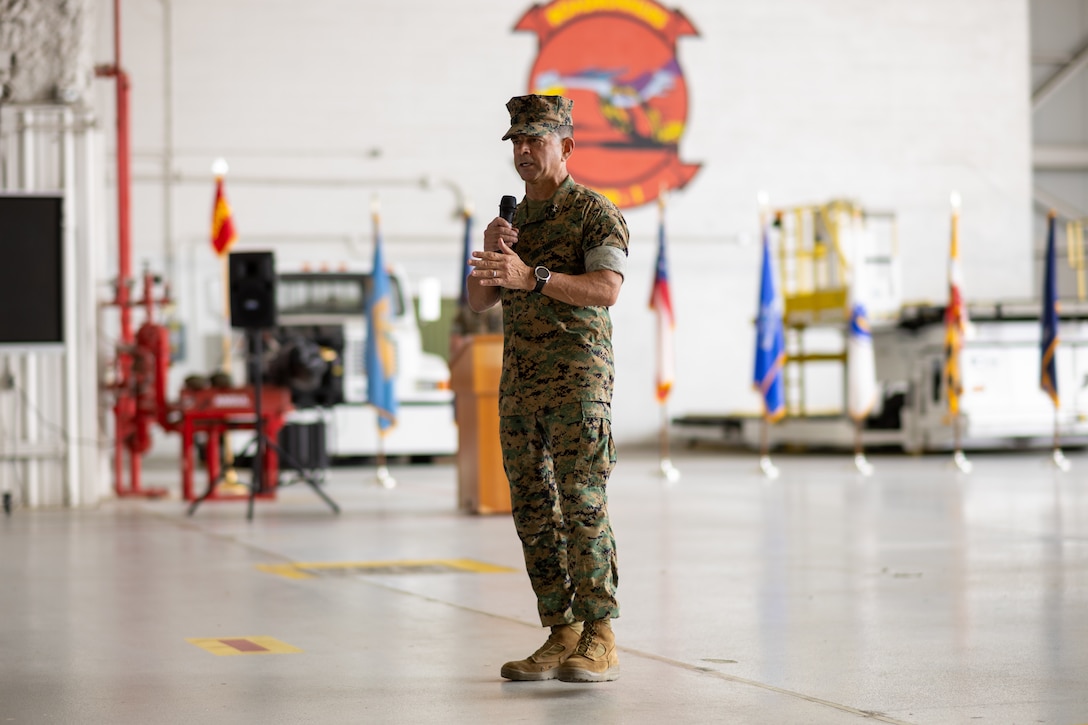 U.S. Marine Corps Maj. Gen. John F. Kelliher III, commanding general, 4th Marine Aircraft Wing, Marine Forces Reserve, speaks during a ceremony recognizing Marine Transport Squadron (VMR) 1’s classification as a full operational capability squadron at Naval Air Station Joint Reserve Base Fort Worth, Texas, June 18, 2025. The ceremony celebrated VMR-1’s achievement of full operational capability with the C-40A aircraft, marks a significant milestone in squadron readiness and success. (U.S. Marine Corps photo by Cpl. Kanoa Thomas)
