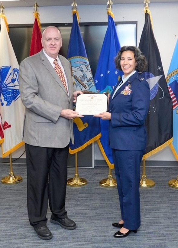 DLA Aviation commander at Oklahoma City is awarded the Meritorious Service Medal in ceremony.