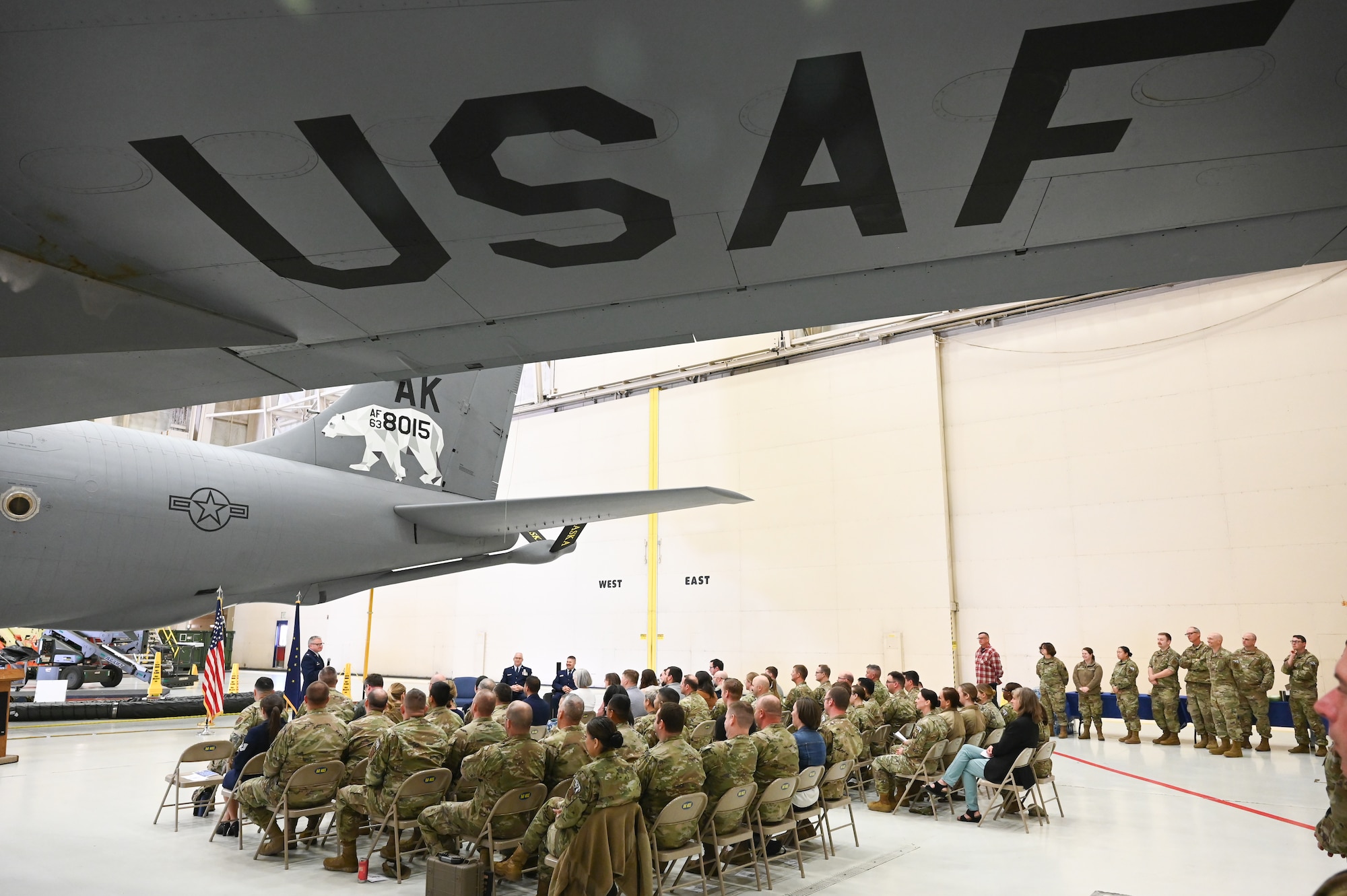 Col. Michael Griesbaum, commander of the 168th Wing, delivers remarks to the wing in front of the KC-135 during the wing’s first-ever Change of Responsibility Ceremony.