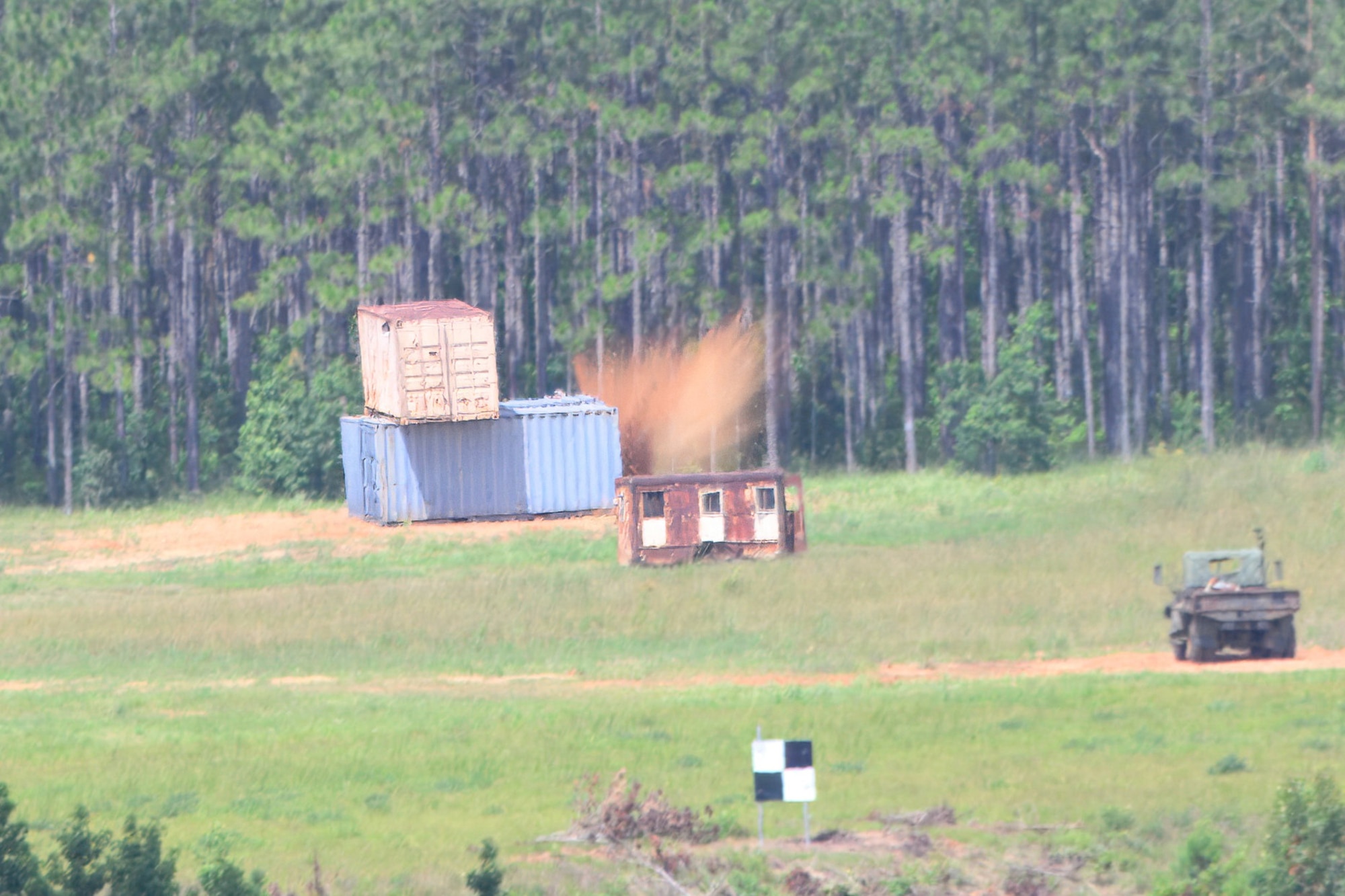 An inert bomb makes impact with an effective target zone at Claiborne Range.