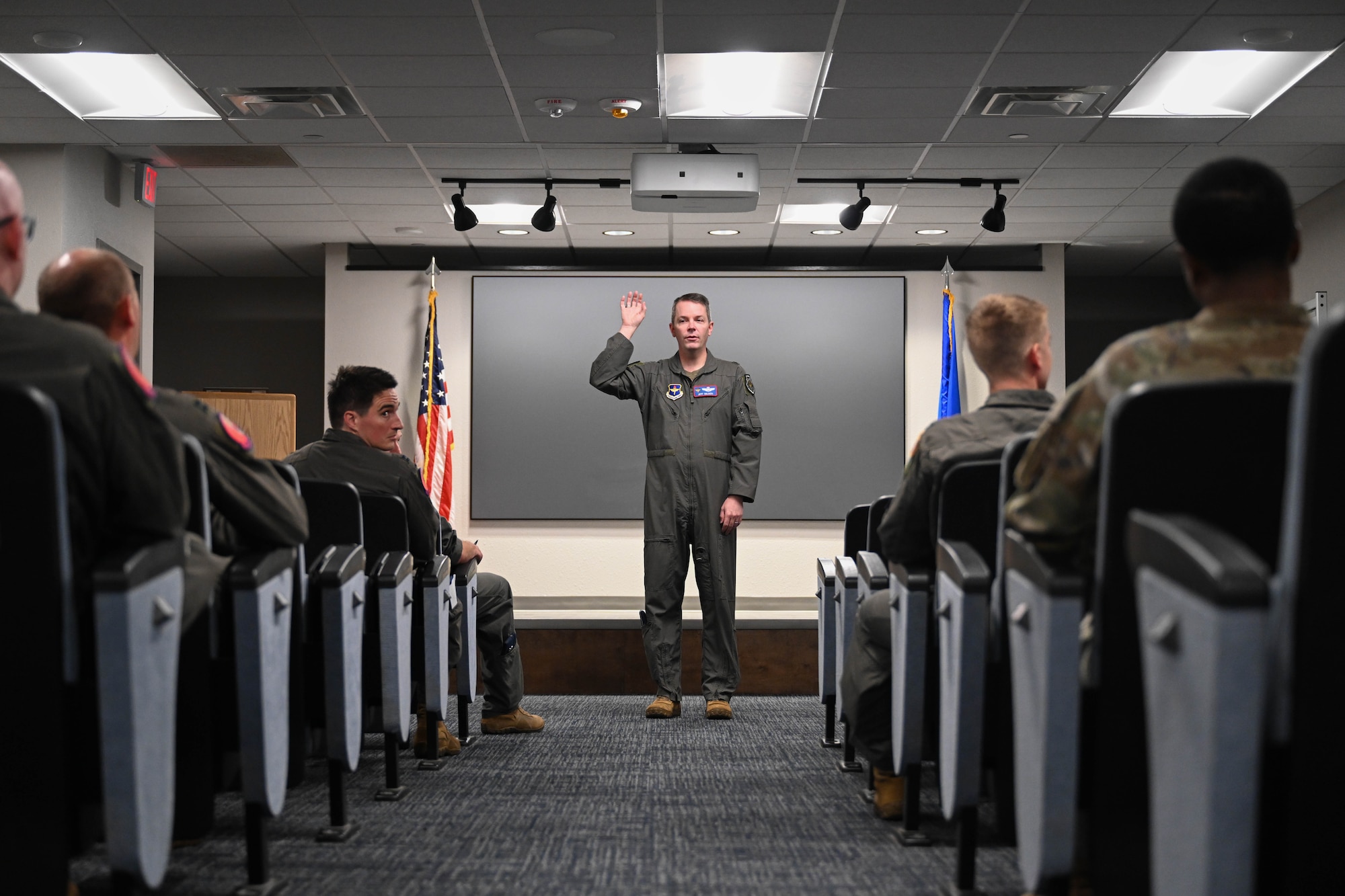 U.S. Air Force Brig. Gen. Jeffery Nelson, director of operations and communications for Air Education and Training Command, speaks to Airmen of the 58th Airlift Squadron (AS) at Altus Air Force Base, Oklahoma, June 9, 2025. As a prior 58th AS commander, Nelson led a mentorship discussion with the permanent party Airmen of the squadron and reminisced on his time with the 58th. (U.S. Air Force photo by Airman 1st Class Lauren Torres)