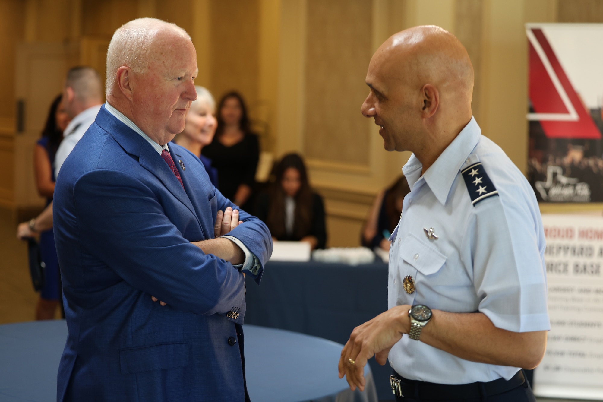 U.S. Air Force Lt. Gen. Brian S. Robinson, commander of Air Education and Training Command speaks with Dr. Joe Leverette, President of Altus Military Affairs Committee