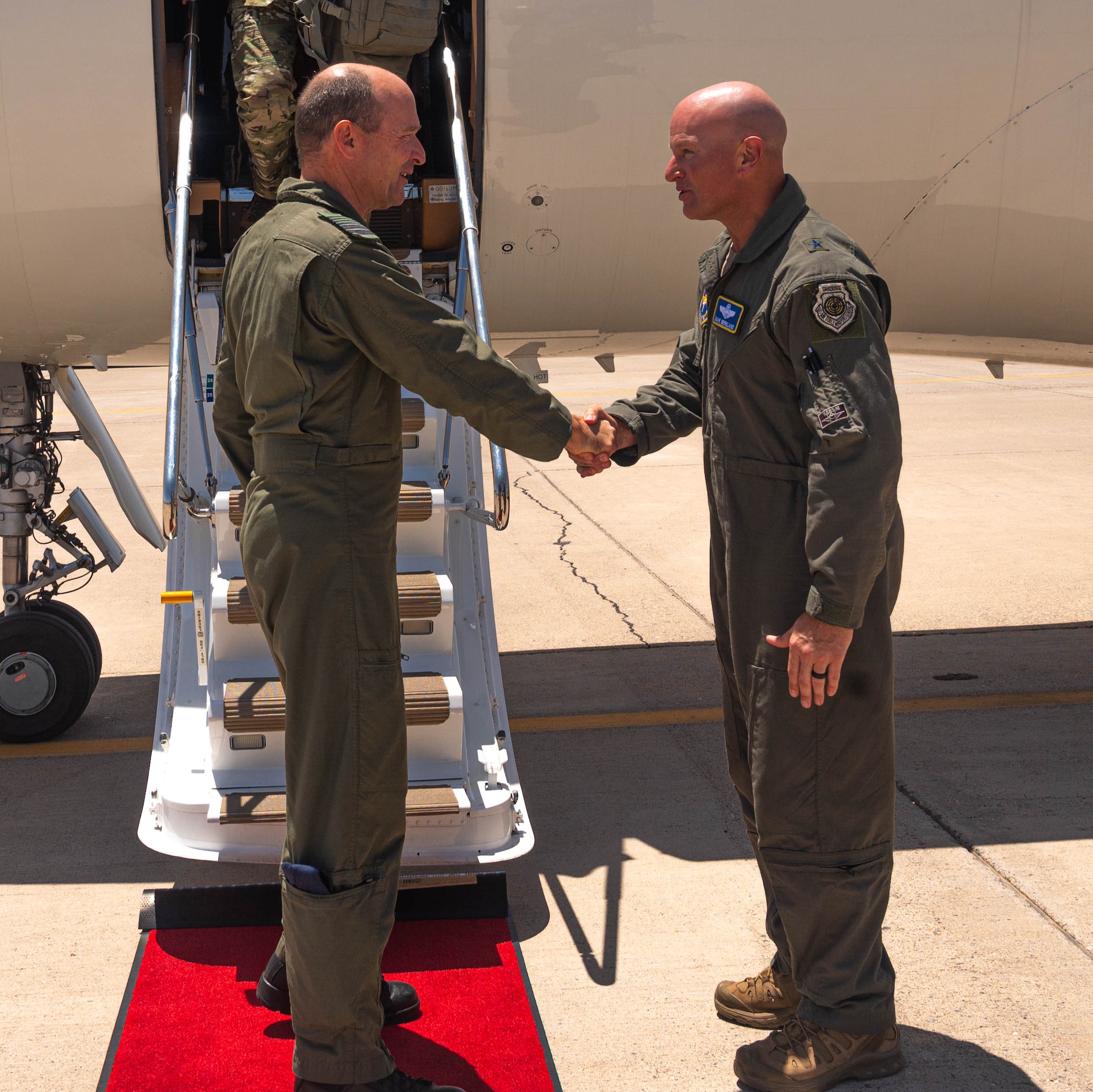 Belgian Chief of Defense Gen. Frederick Vansina (left), shakes hands with U.S. Air Force Brig. Gen. David Berkland (right), 56th Fighter Wing commander, upon arrival.