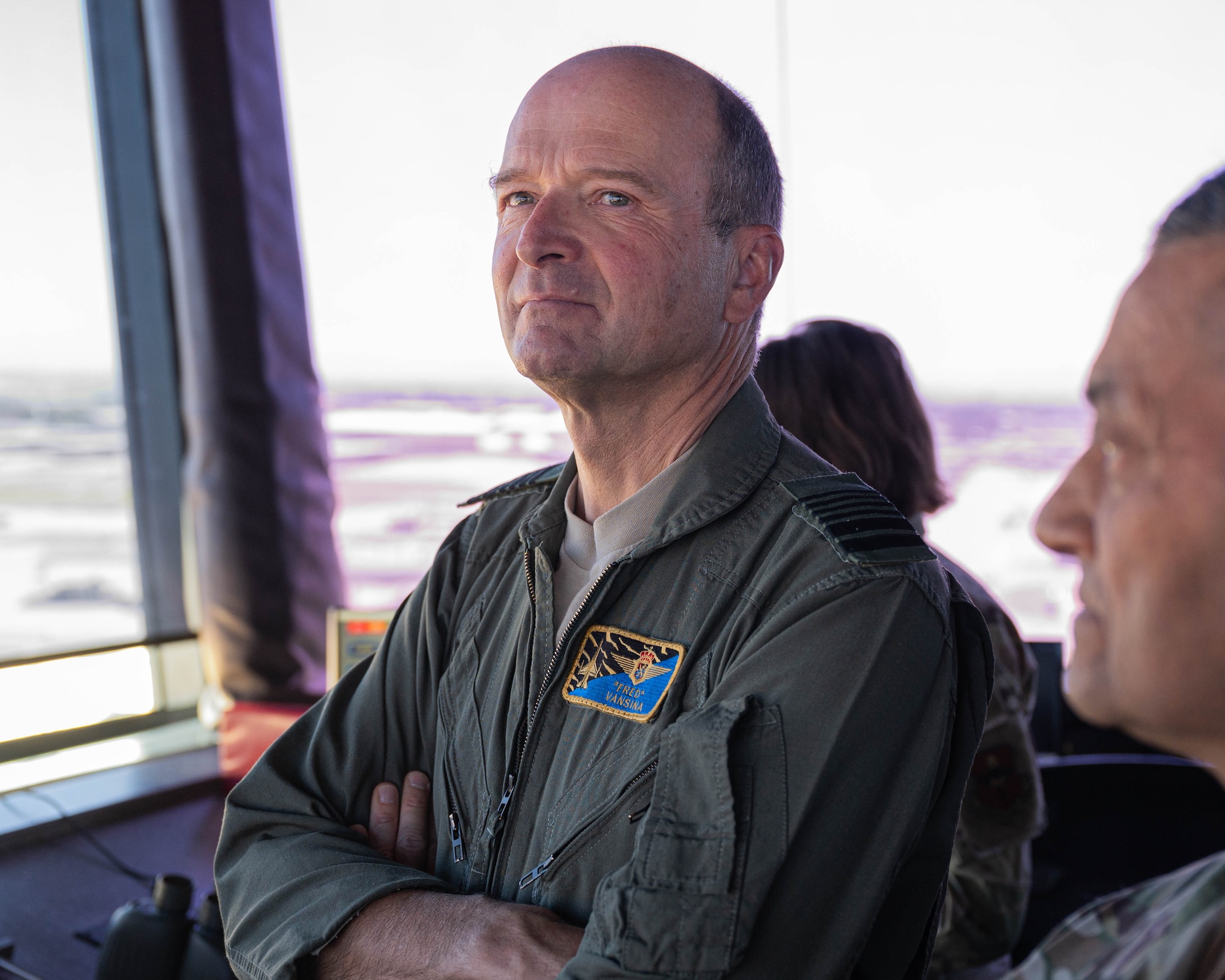 Belgian Chief of Defense Gen. Frederick Vansina, observes operations from the air traffic control tower.