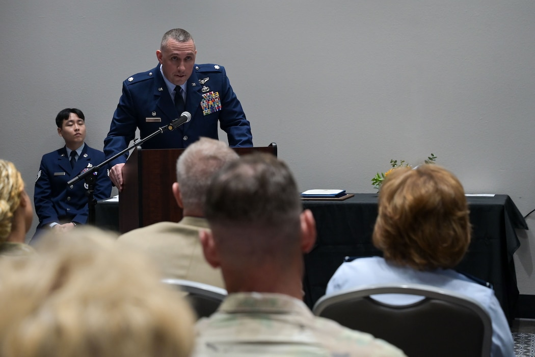 U.S. Air Force Lt. Col. Christopher Cardinale, incoming 313th Training Squadron commander, addresses the audience during the change of command ceremony at the Powell Event Center, Goodfellow Air Force Base, Texas, June 18, 2025. The 313 TRS provides premier advanced and supplemental intelligence training to develop combat-competent Airmen, Joint Warfighters, and International Allies. (U.S. Air Force photo by Senior Airman Evelyn J. D’Errico)
