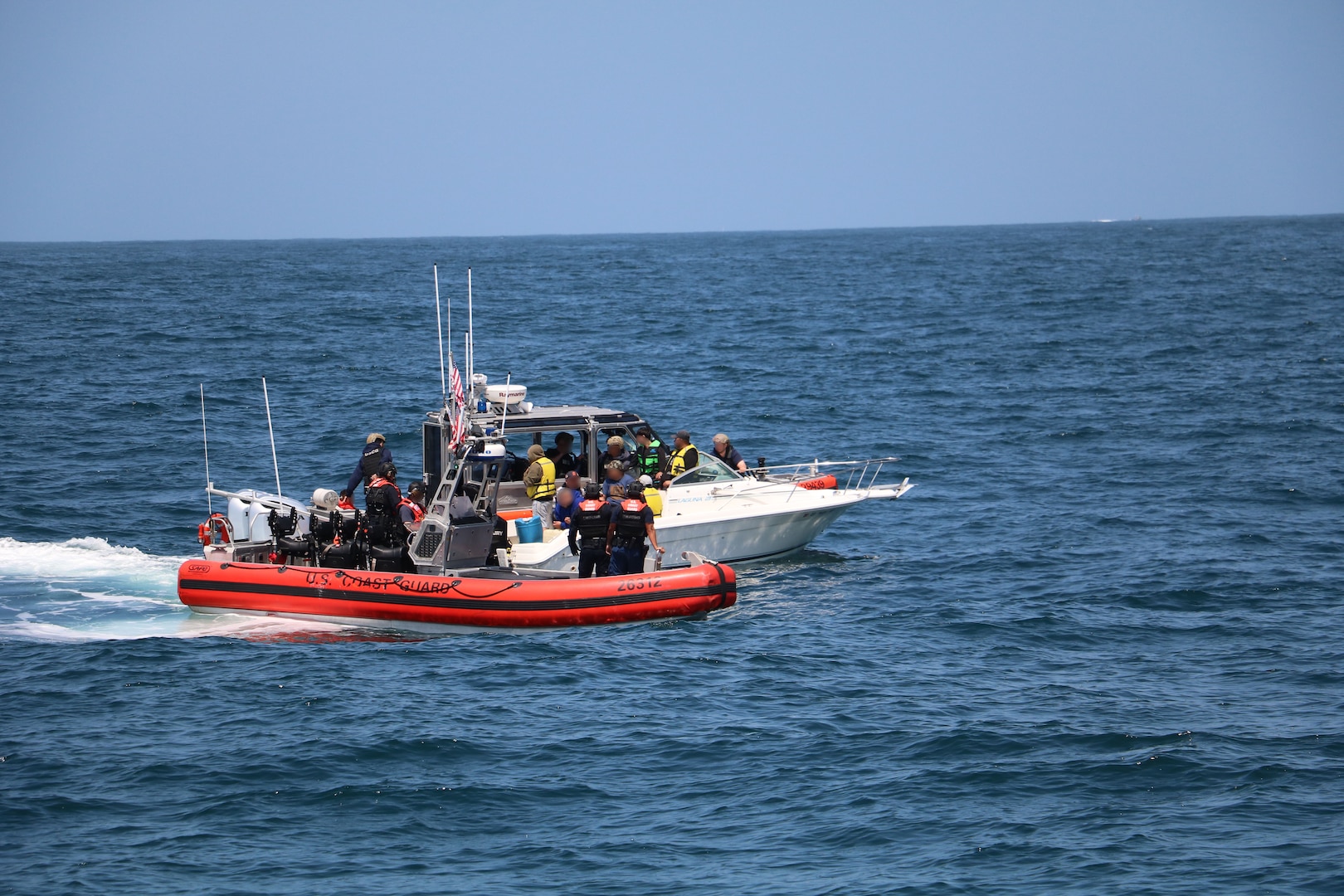 The Coast Guard interdicted 10 aliens aboard a 25-foot white Sea Ray vessel in the vicinity of Point Loma, June 23, 2025.  The Coast Guard maintains a robust presence along the maritime border and works closely with federal partners to detect, deter, and disrupt illegal maritime migration ventures. (U.S. Coast Guard photo courtesy of CGC Benjamin Bottoms/released).