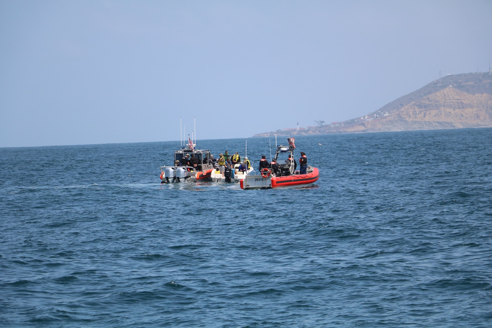 The Coast Guard interdicted 10 aliens aboard a 25-foot white Sea Ray vessel in the vicinity of Point Loma, June 23, 2025.  The Coast Guard maintains a robust presence along the maritime border and works closely with federal partners to detect, deter, and disrupt illegal maritime migration ventures. (U.S. Coast Guard photo courtesy of CGC Benjamin Bottoms/released).