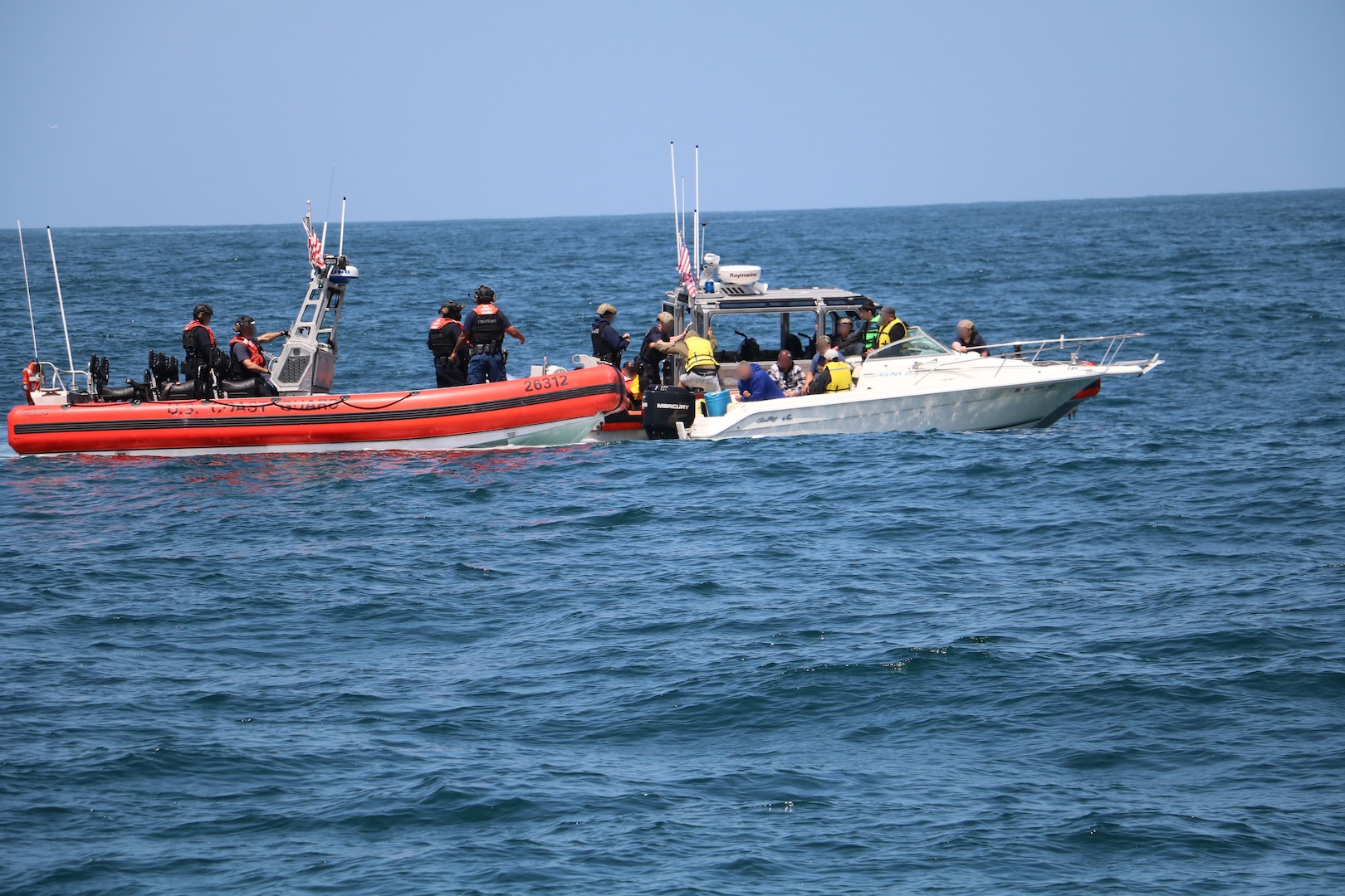 The Coast Guard interdicted 10 aliens aboard a 25-foot white Sea Ray vessel in the vicinity of Point Loma, June 23, 2025.  The Coast Guard maintains a robust presence along the maritime border and works closely with federal partners to detect, deter, and disrupt illegal maritime migration ventures. (U.S. Coast Guard photo courtesy of CGC Benjamin Bottoms/released).