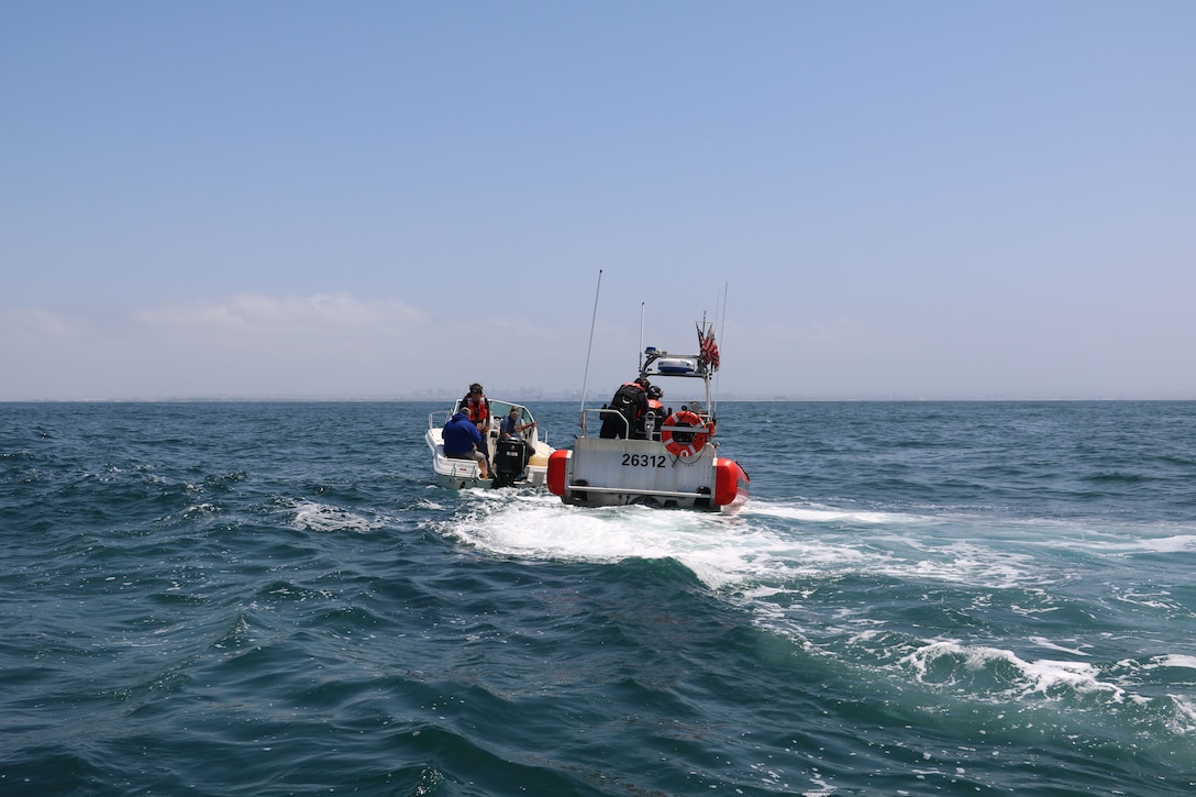 The Coast Guard interdicted 10 aliens aboard a 25-foot white Sea Ray vessel in the vicinity of Point Loma, June 23, 2025.  The Coast Guard maintains a robust presence along the maritime border and works closely with federal partners to detect, deter, and disrupt illegal maritime migration ventures. (U.S. Coast Guard photo courtesy of CGC Benjamin Bottoms/released).