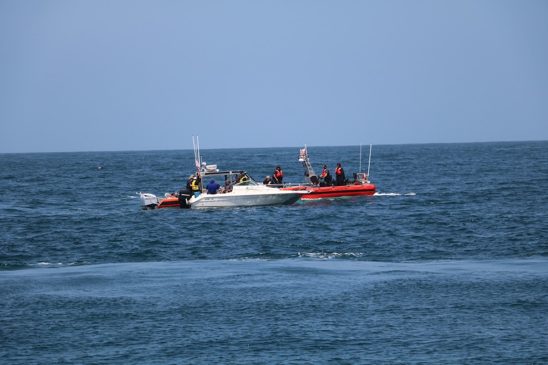 The Coast Guard interdicted 10 aliens aboard a 25-foot white Sea Ray vessel in the vicinity of Point Loma, June 23, 2025.  The Coast Guard maintains a robust presence along the maritime border and works closely with federal partners to detect, deter, and disrupt illegal maritime migration ventures. (U.S. Coast Guard photo courtesy of CGC Benjamin Bottoms/released).