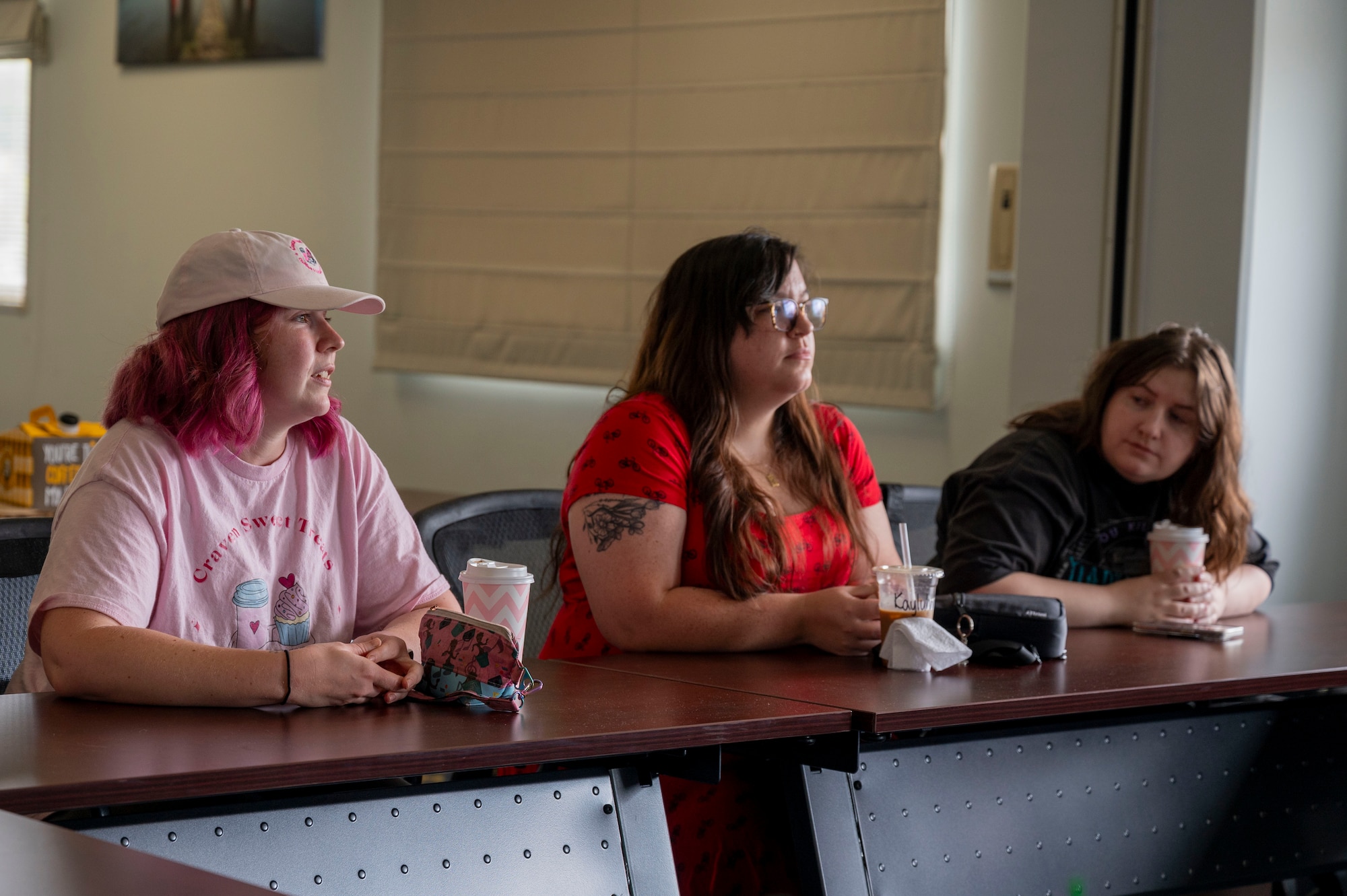 Spouses of Yokota engage in conversation during a spouse coffee chat.