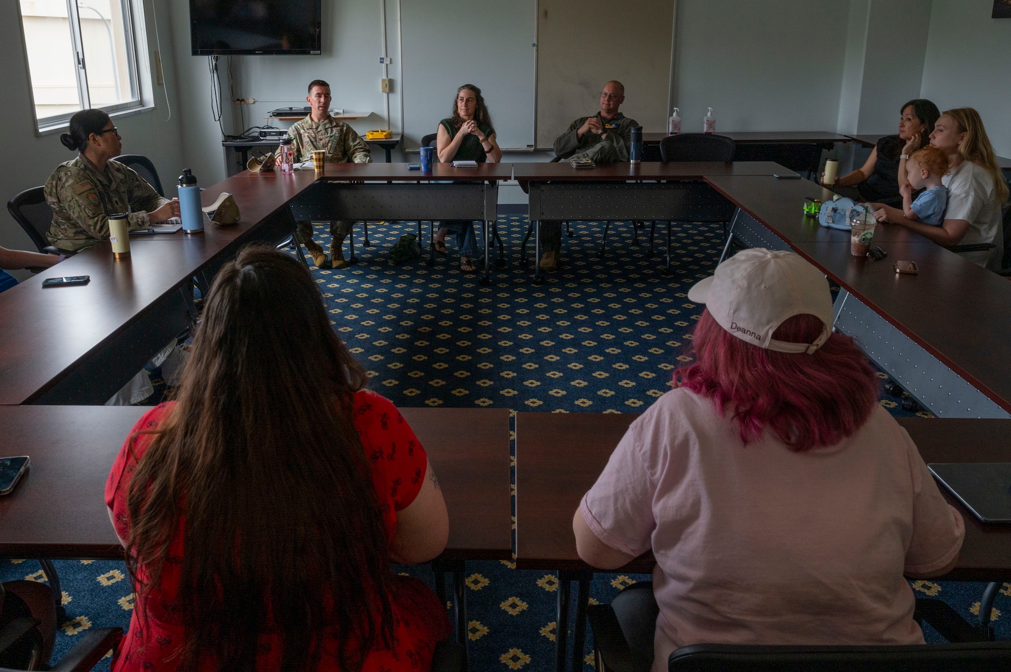Spouses of Yokota engage in conversation during a spouse coffee chat.