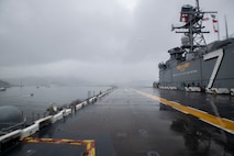 SASEBO, Japan (June 23, 2025) – The America-class amphibious assault ship USS Tripoli (LHA 7) arrives in Sasebo, Japan June 23, 2025. USS Tripoli (LHA 7) is forward deployed to Sasebo, Japan, and operates in U.S. 7th Fleet, the U.S. Navy’s largest forward-deployed numbered fleet, which routinely interacts and operates with allies and partners in preserving a free and open Indo-Pacific region. (U.S. Navy photo by Mass Communication Specialist 1st Class Danian C. Aiko-Douglas)