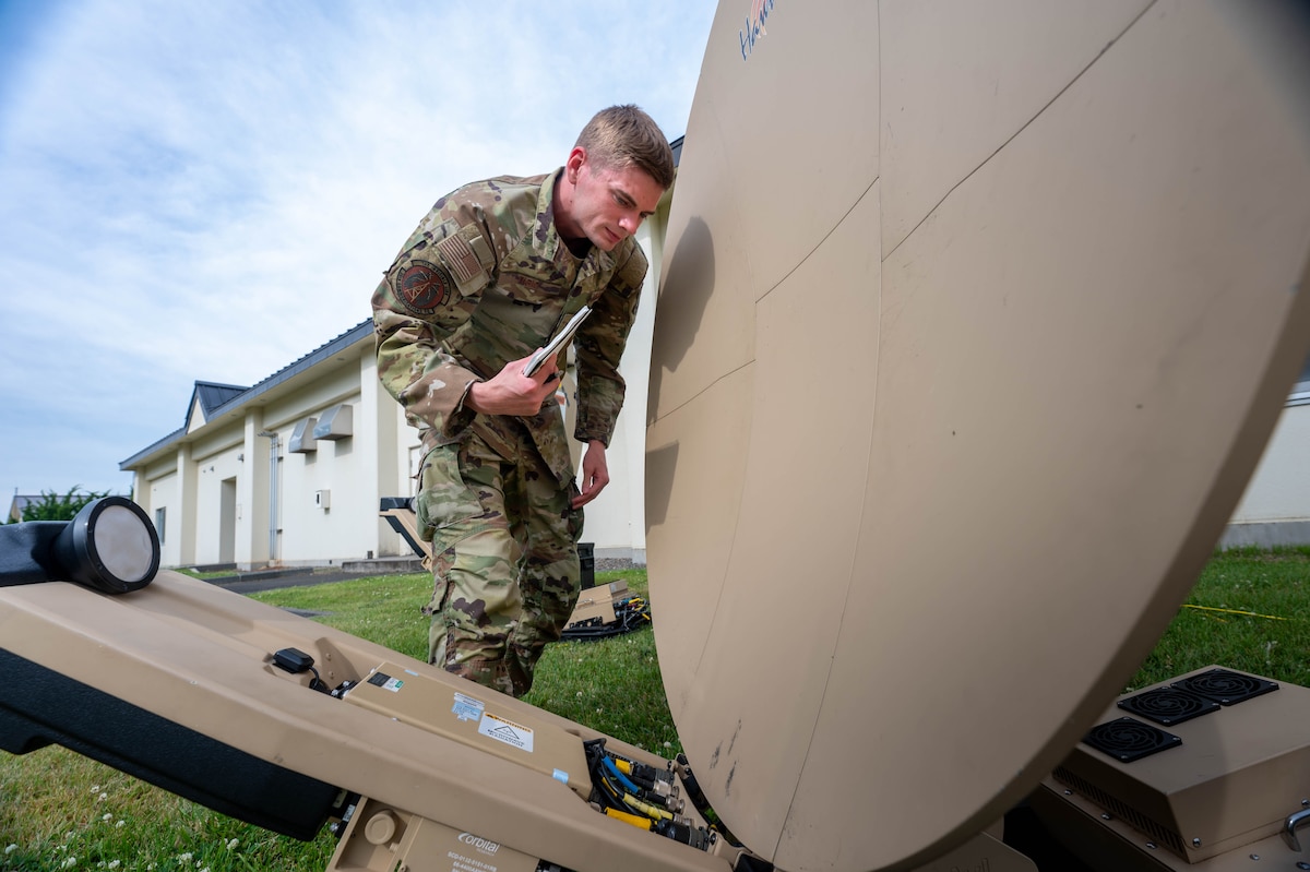 U.S. Air Force Senior Airman Aaron Dirig, 35th Communications Squadron expeditionary communications noncommissioned officer in charge, troubleshoots a Hawkeye III Lite satellite system Rapid Response Communications Kit at Misawa Air Base, Japan, June 24, 2025.