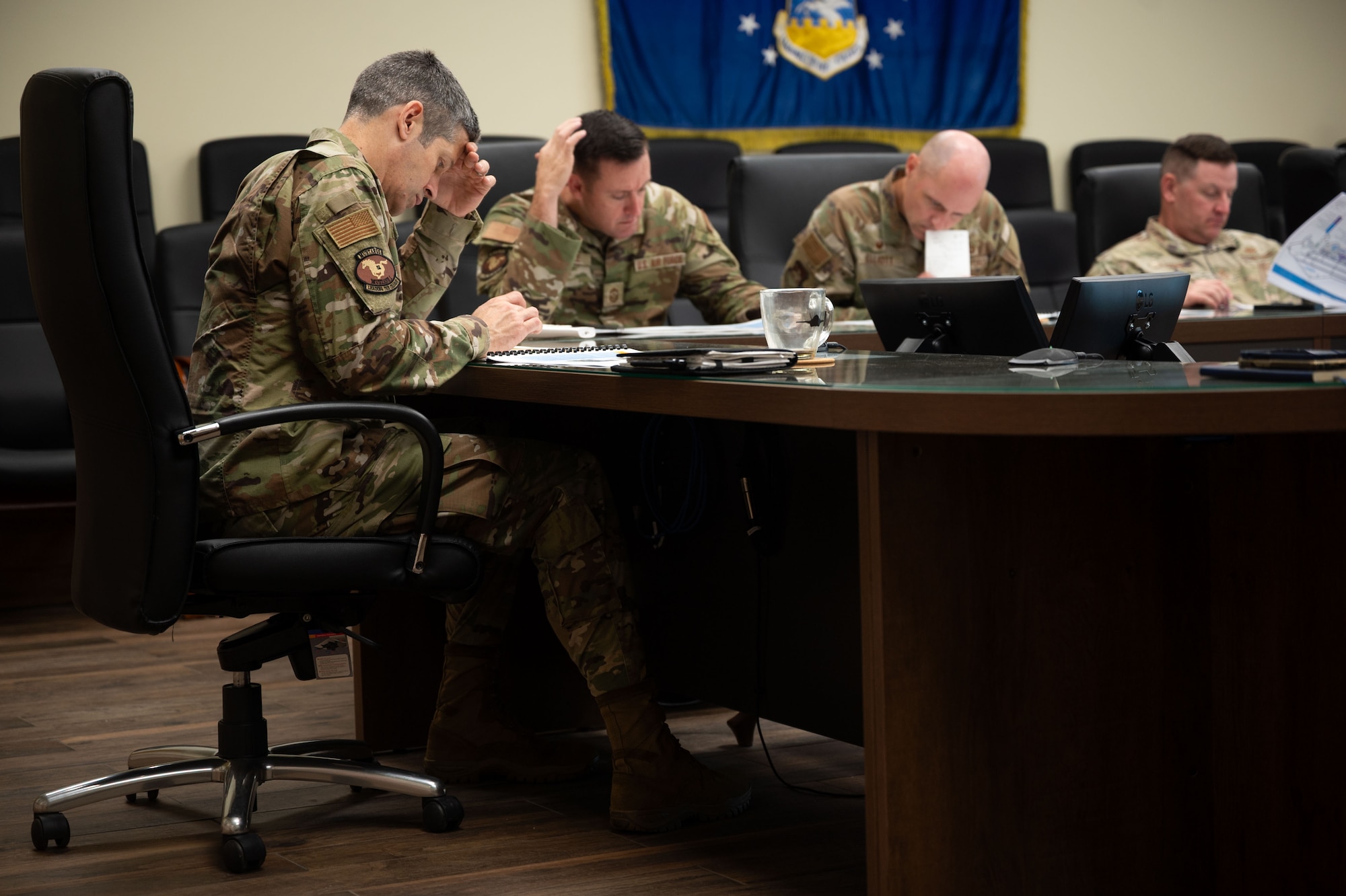 U.S. Air Force Col. William McKibban, 51st Fighter Wing commander, reviews Osan’s updated Installation Development Plan during a board meeting.