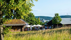 Members of the local community attend the Kaiserslautern Summer Social at the Gartenschau, Kaiserslautern, June 16, 2025. The event builds partnership between the US
military and the City of Kaiserslautern, focusing on providing military leaders with the opportunity to interact with key political figures and local leaders from the City of Kaiserslautern. (U.S. Air Force photo by Senior Airman Sabrina Fuller-Judd)