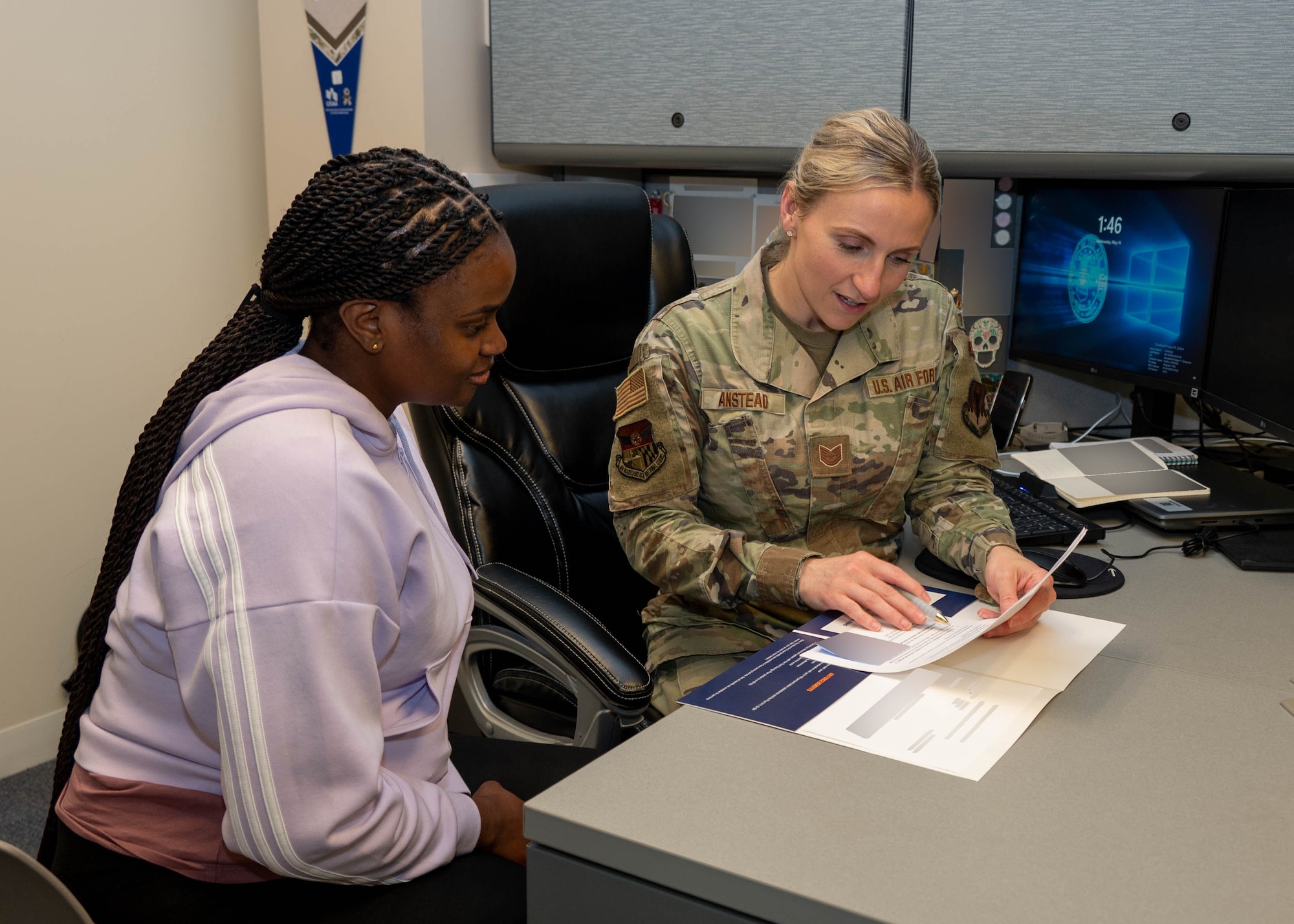 Maryland Air National Guard Tech. Sgt. Tiffany Anstead, a recruiter for the 175th Wing, works with a recruit during an appointment in the recruiting office at Warfield Air National Guard Base at Martin State Airport, Maryland, May 14, 2025. Anstead was presented the Master Sgt. Salvador Torres Memorial Award at the end of her seven-week recruiting training in April, and has already been hard at work meeting with new recruits. Portions of this image were blurred for security reasons. (U.S. Air National Guard photo by Airman 1st Class Sarah Hoover)