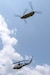 A CH-47 Chinook helicopter from 2-104th General Support Aviation Battalion, 28th Expeditionary Combat Aviation Brigade airlifts a decommissioned UH-1 “Huey” helicopter from the top Blue Mountain near Fort Indiantown Gap, Pennsylvania, to the installation on June 20, 2025. (Pennsylvania National Guard photo by Wayne V. Hall)
