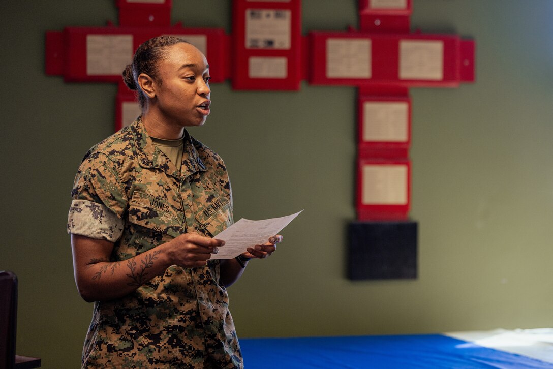 A U.S. Navy hospital corpsman with 2d Battalion, 2d Marine Regiment, 2d Marine Division speaks during a celebration of the 127th Hospital Corpsman Birthday on Marine Corps Base Camp Lejeune, North Carolina, June 18, 2025. The Hospital Corps was established on June 17, 1898, and comprises more than 26,000 active duty and reserve hospital corpsmen that practice or train in 40 technical specialties. (U.S. Marine Corps photo by Lance Cpl. Daysia McCree)