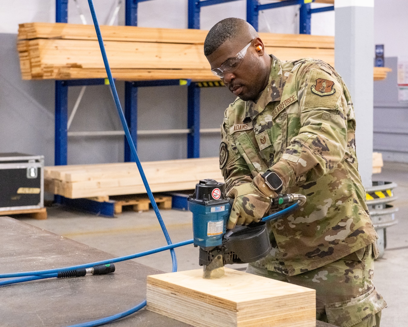 U.S. Air Force Tech. Sgt. Rashaad Adams, 126th Transportation Management Office, 126th Logistics Readiness Squadron, 126th Air Refueling Wing, Scott Air Force Base, Illinois, U.S. Air National Guard, nails together shoring while deployed for training at Ramstein Air Base, Germany June 5, 2025.