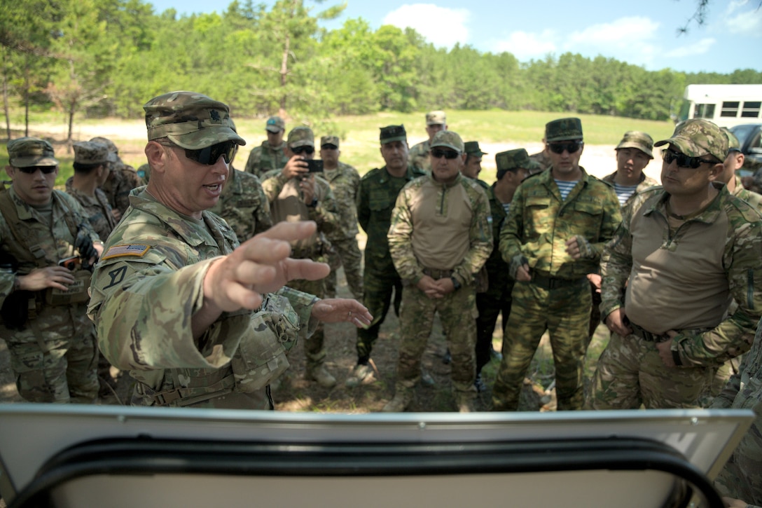 To close out the first week of Regional Cooperation 25, MA Army National Guard Capt. Christian Carter of 51st Troop Command, with the aid of Green Berets and Civil Affairs Soldiers mobilized from 5th Special Forces Group and linguists assigned to 300th Military Intelligence Brigade, led camouflage and patrol training as part of Regional Cooperation 25.

As Regional Cooperation advances, each field training exercise portion builds up participants’ skills for a culminating exercise. (U.S. Army photo by Sgt. Justin Leva)