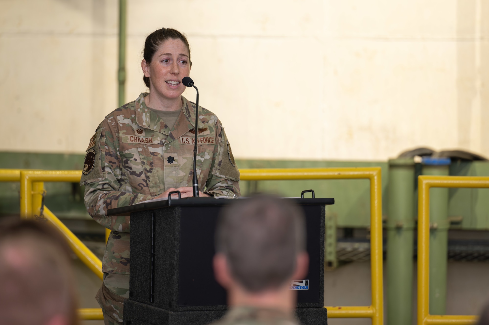 Lt. Col. Rachel Chrash speaks after assuming command of the 718th Test Squadron during a Change of Command ceremony, June 18, 2025, at Arnold Air Force Base, Tenn., headquarters of Arnold Engineering Development Complex. The ceremony was attended by members of Chrash’s family and some of her new colleagues at Arnold. (U.S. Air Force photo by Keith Thornburgh)