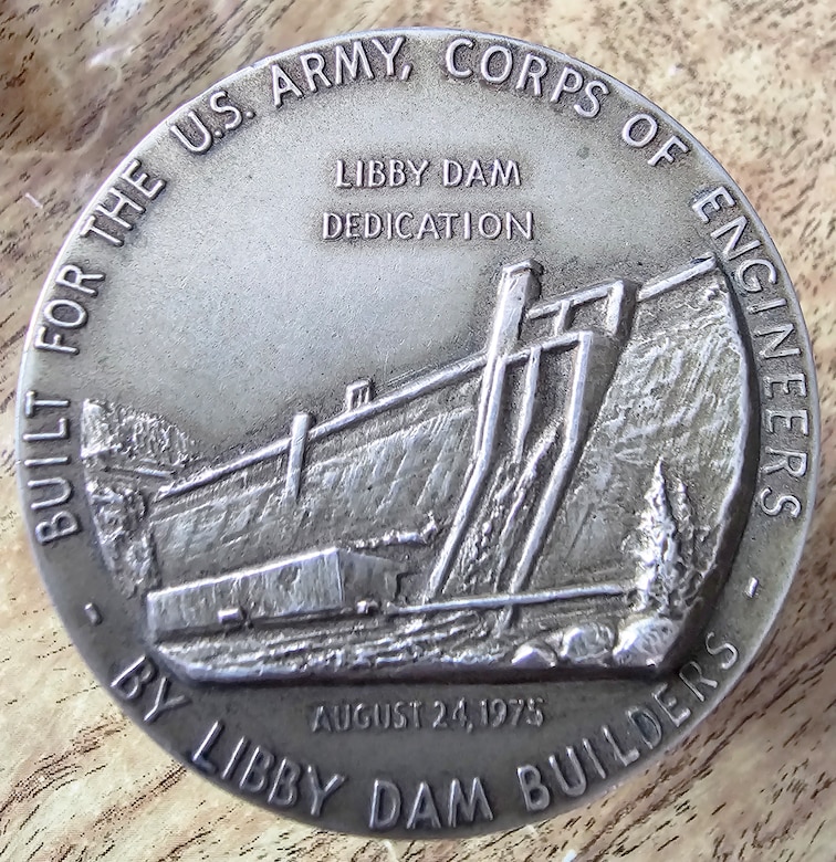 Libby Dam Natural Resource Manager Tana Wilson's Grandpa Whitey's Dedication coin given to the builders during the operating project's official dedication by President Gerald Ford, Aug. 24, 1975. The U.S. Army Corps of Engineers, Seattle District, will commemorate 50 years of the dam's dedication with an unveiling and Open House, Aug. 23, 2025. The event will include a tour on top of the dam, a visit of the Treaty Tower, informational booths, food booths and entertainment. (Photo courtesy Tana Wilson)