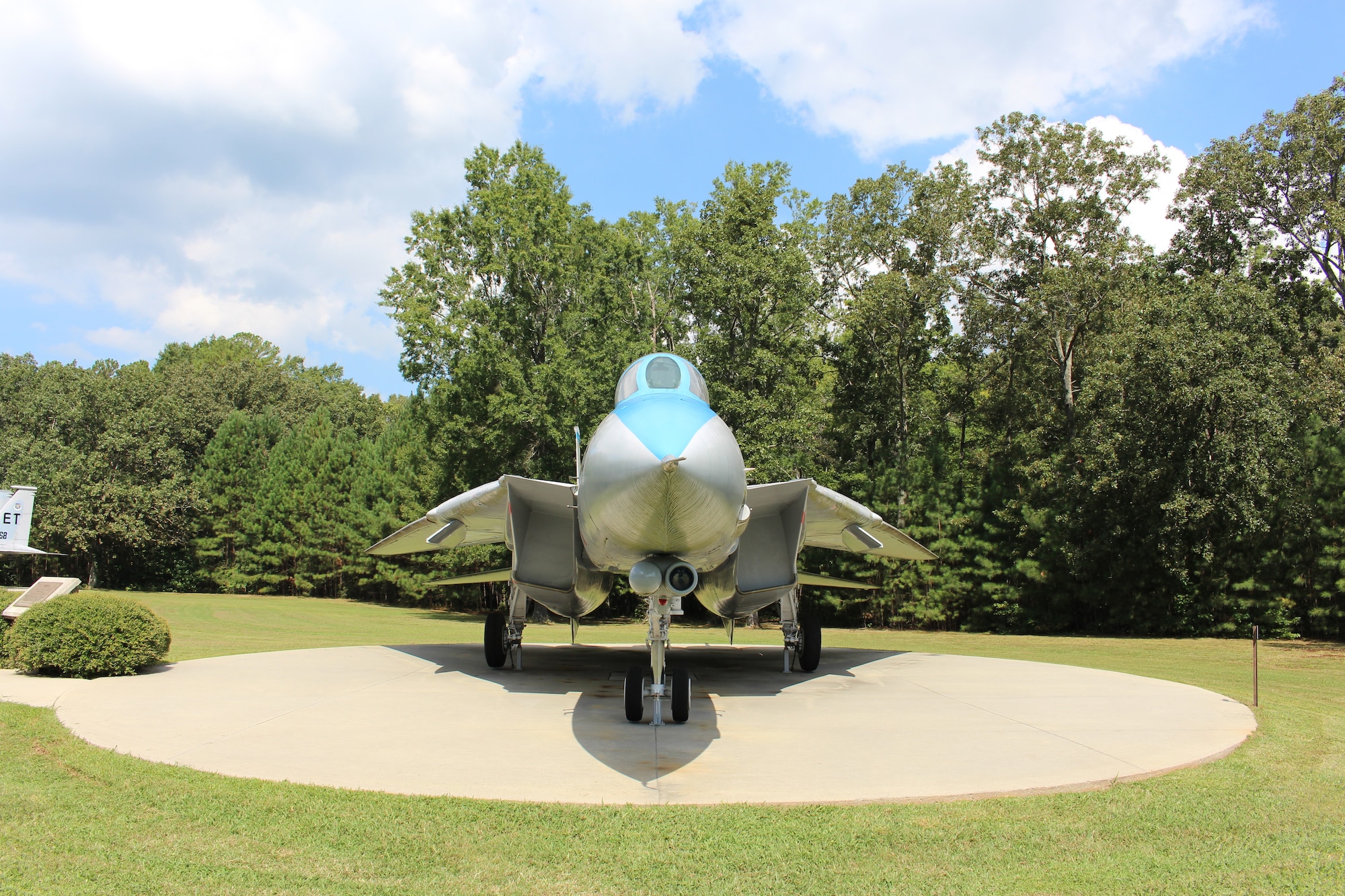 The static F-14 Tomcat on display outside the Main Gate at Arnold Air Force Base, Tenn., is dedicated to Navy Lt. Kara Hultgreen. Hultgreen was the first female carrier-based combat fighter pilot in the U.S. Navy and the first female fighter pilot in the U.S. military to die in a crash. She died Oct. 25, 1994, when the Tomcat she was piloting experienced engine failure on final approach to an aircraft carrier and crashed into the Pacific Ocean near San Diego, Calif. (U.S. Air Force photo by Kali Bradford)