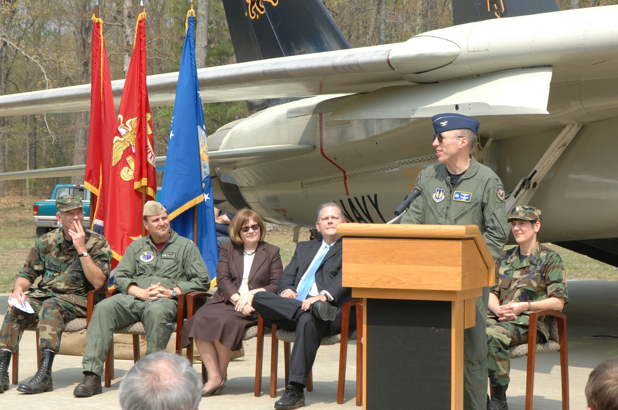 Then-Arnold Engineering Development Complex Commander Col. Art Huber speaks during the March 2007 ceremony to dedicate the F-14 Tomcat static display at Arnold Air Force Base, Tenn., in memory of Lt. Kara Hultgreen. Hultgreen was the first female carrier-based combat fighter pilot in the U.S. Navy and the first female fighter pilot in the U.S. military to die in a crash. She died Oct. 25, 1994, when the Tomcat she was piloting experienced engine failure on final approach to an aircraft carrier and crashed into the Pacific Ocean near San Diego, Calif. (U.S. Air Force photo)