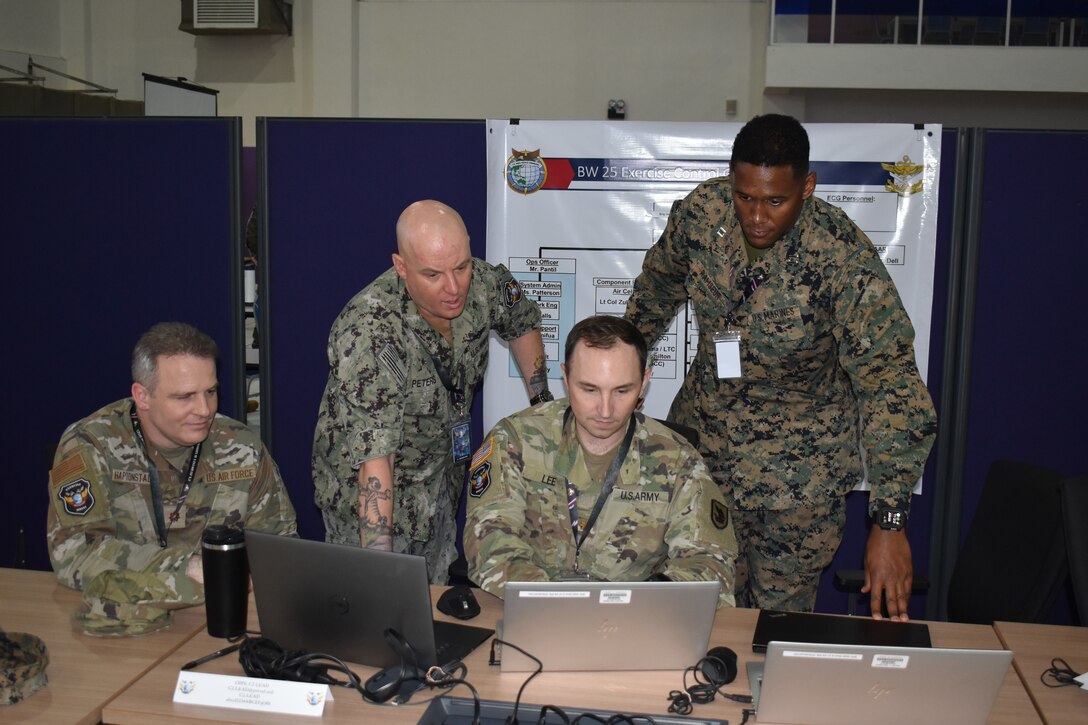 Members of the U.S. Air Force, Navy, Army, and Marine Corps conduct planning at the Joint Warfighting Center, Kuantan, Malaysia, June 23, 2025. Bersama Warrior is an annual, bilateral joint exercise sponsored by U.S. Indo-Pacific Command and hosted by the Malaysian Armed Forces. This year marks the 11th iteration of the exercise, and the first time MRF-D is participating, enhancing U.S. and Malaysian defense readiness and improving combined joint interoperability. MRF-D is an annual six-month rotational deployment to enhance interoperability with the Australian Defence Force and allies and partners and provide a forward postured crisis response force in the Indo-Pacific. (U.S. Marine Corps photo by 1st Lt. Samuel DeRobertis)