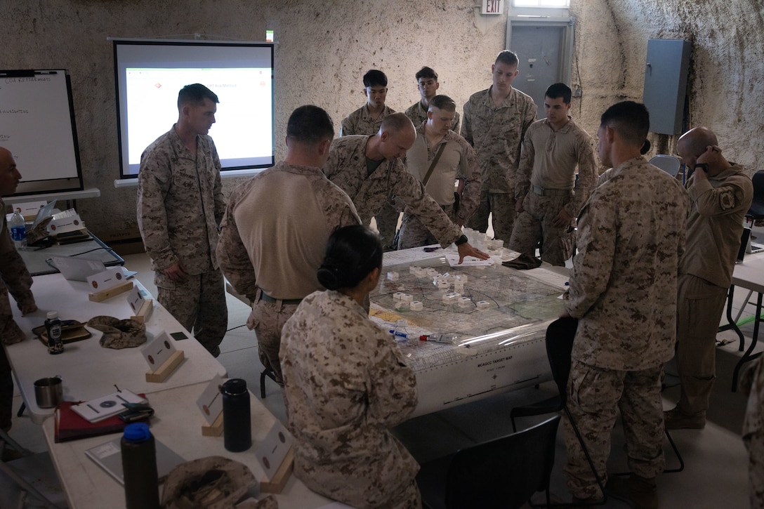 Marines with Marine Air-Ground Task Force (MAGTF) 25 participate in wargaming during Integrated Training Exercise 3-25 (ITX 3-25), Marine Corps Air Ground Combat Center, Twentynine Palms, California, June 7th, 2025. This wargame is an exercise in the formal Marine Corps Planning Process, which includes problem framing, Course of Action (COA) development, and COA completion. Wargaming helps Marines identify weaknesses and points of friction; these lessons are used to refine plans and implement them again with improvements. ITX is a critical Marine Air-Ground Task Force exercise for the Marine Forces Reserve’s training cycle, confirming unit readiness through live-fire and combined arms integration. (U.S. Marine Corps photo by Lance Cpl. Edward Spears)