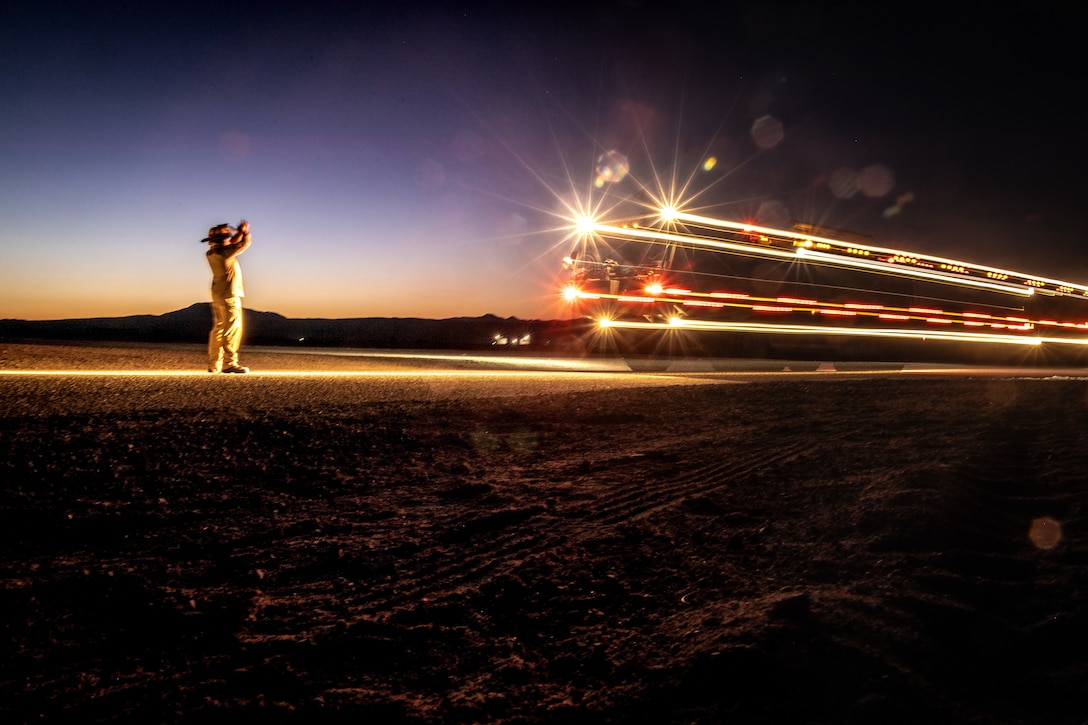 U.S. Marine Corps Staff Sgt. Oster Owens, a firefighter, with Aircraft Rescue and Fire Fighting, Marine Wing Support Squadron 472, 4th Marine Aircraft Wing halts a P-19R Aircraft Rescue and Firefighting truck during a simulated aircraft fire-fighting drill at Integrated Training Exercise 3-25, Marine Corps Air Ground Combat Center, Twentynine Palms, California, June 17, 2025. ITX is a critical Marine Air-Ground Task Force exercise for the Marine Forces Reserve’s training cycle, confirming unit readiness through live-fire and combined-arm integration. (U.S. Marine Corps photo by Lance Cpl. Edward Spears)