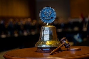 System of Cooperation Among the American Air Forces (SICOFAA) ceremonial bell sits on the table during the 65th Conference of the American Air Chiefs (CONJEFAMER) meeting in Asuncion, Paraguay, June 18, 2025. SICOFAA began as a meeting of officers from 13 different countries in 1961 with the goal of strengthening the bond between the Air Forces in the Western Hemisphere. It has since grown to include XX countries. The passing of the bell stands as a long-standing tradition in SICOFAA’s CONJEFAMER and embodies the unity and shared mission among Western Hemisphere air forces. (U.S. Air Force photo by Andrea Jenkins)