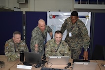 Members of the U.S. Air Force, Navy, Army, and Marine Corps conduct planning at the Joint Warfighting Center, Kuantan, Malaysia, June 23, 2025. Bersama Warrior is an annual, bilateral joint exercise sponsored by U.S. Indo-Pacific Command and hosted by the Malaysian Armed Forces. This year marks the 11th iteration of the exercise, and the first time MRF-D is participating, enhancing U.S. and Malaysian defense readiness and improving combined joint interoperability. MRF-D is an annual six-month rotational deployment to enhance interoperability with the Australian Defence Force and allies and partners and provide a forward postured crisis response force in the Indo-Pacific. (U.S. Marine Corps photo by 1st Lt. Samuel DeRobertis)