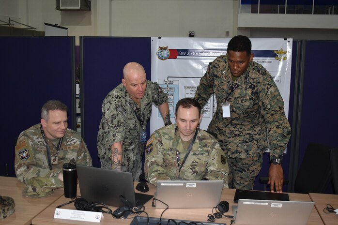 Members of the U.S. Air Force, Navy, Army, and Marine Corps conduct planning at the Joint Warfighting Center, Kuantan, Malaysia, June 23, 2025. Bersama Warrior is an annual, bilateral joint exercise sponsored by U.S. Indo-Pacific Command and hosted by the Malaysian Armed Forces. This year marks the 11th iteration of the exercise, and the first time MRF-D is participating, enhancing U.S. and Malaysian defense readiness and improving combined joint interoperability. MRF-D is an annual six-month rotational deployment to enhance interoperability with the Australian Defence Force and allies and partners and provide a forward postured crisis response force in the Indo-Pacific. (U.S. Marine Corps photo by 1st Lt. Samuel DeRobertis)