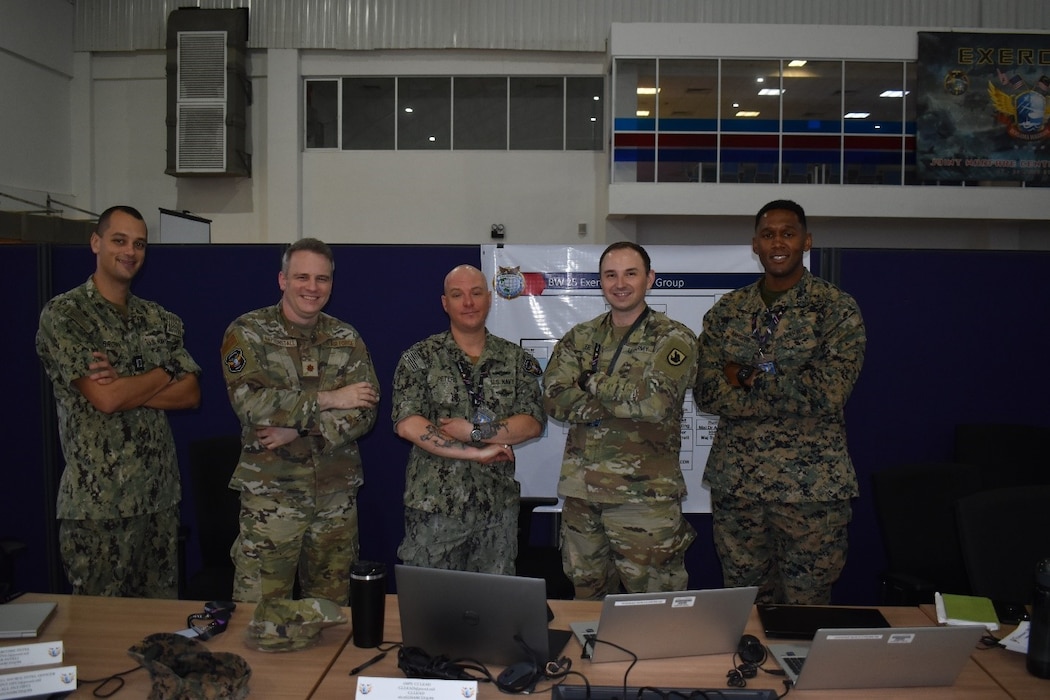 Members of the U.S. Air Force, Navy, Army, and Marine Corps pose for a group photo at the Joint Warfighting Center, Kuantan, Malaysia, June 23, 2025.