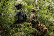 U.S. Marines with 2nd Battalion, 1st Marine Regiment, Marine Rotational Force – Darwin 25.3, I Marine Expeditionary Force Forward, and Philippine Marines with 3rd Brigade set security during KAMANDAG 9 at Oyster Bay, Palawan, Philippines, June 11, 2025. KAMANDAG is an annual Philippine Marine Corps and U.S. Marine Corps-led exercise aimed at enhancing the Armed Forces of the Philippines’ defense and humanitarian capabilities by providing valuable training in combined operations with foreign militaries in the advancement of a Free and Open Indo-Pacific. MRF-D is an annual six-month rotational deployment to enhance interoperability with the Australian Defence Force and allies and partners and provide a forward postured crisis response force in the Indo-Pacific. (U.S. Marine Corps photo by Cpl. Anita Ramos)
